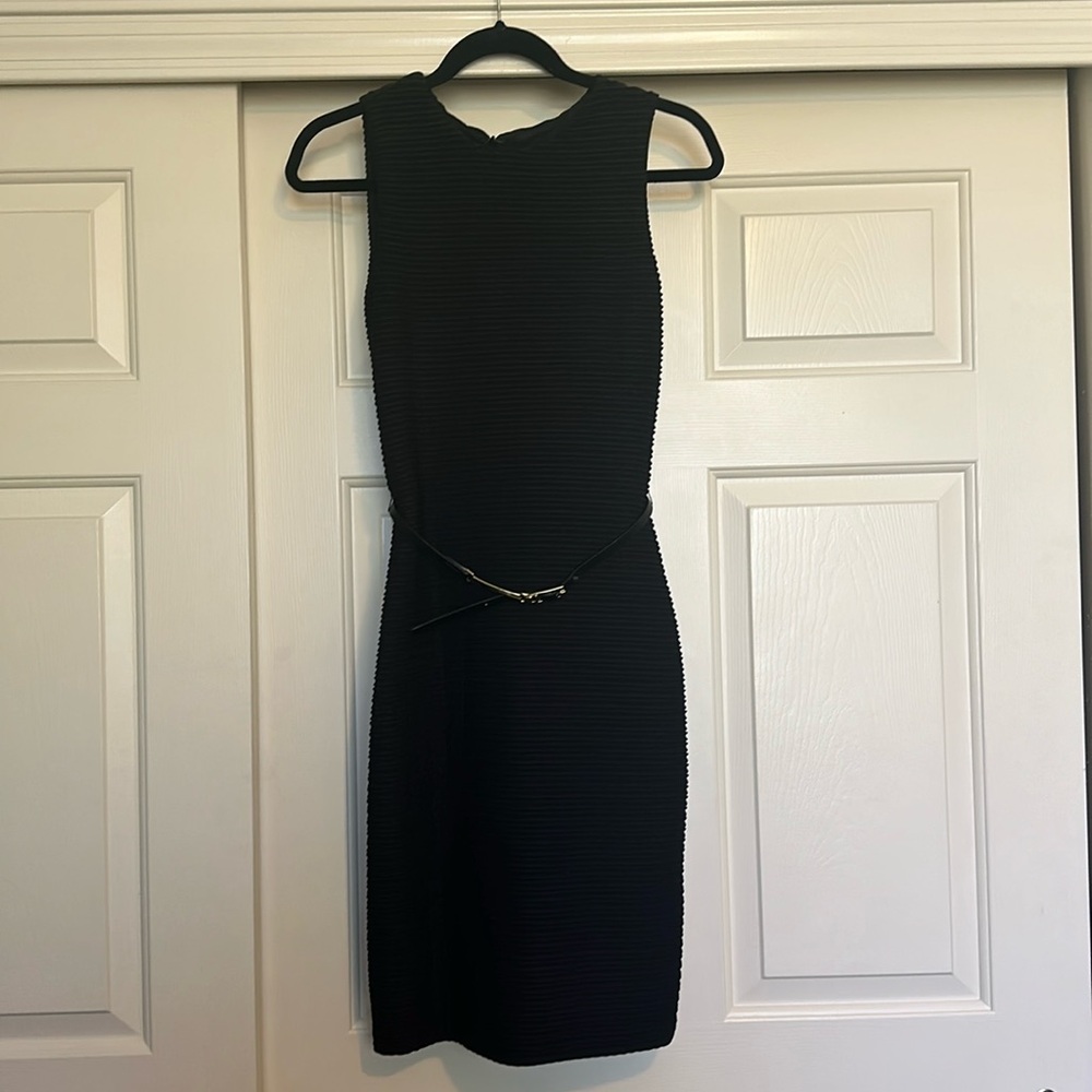Calvin Klein black knee length dress. Fitted. Size 2.